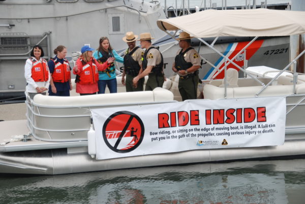pic a group of people on a boat