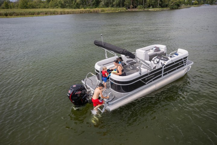 group of people riding a pontoon boat of Lake Wylie Boat Rental
