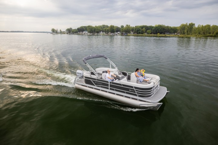 group of people riding a pontoon boat of Lake Wylie Boat Rental