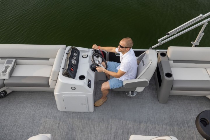 a person riding a pontoon boat of Lake Wylie Boat Rental